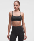 Wunder Train Strappy Racer Bra *Light Support, A/B Cup Zebra Camo Emboss Black