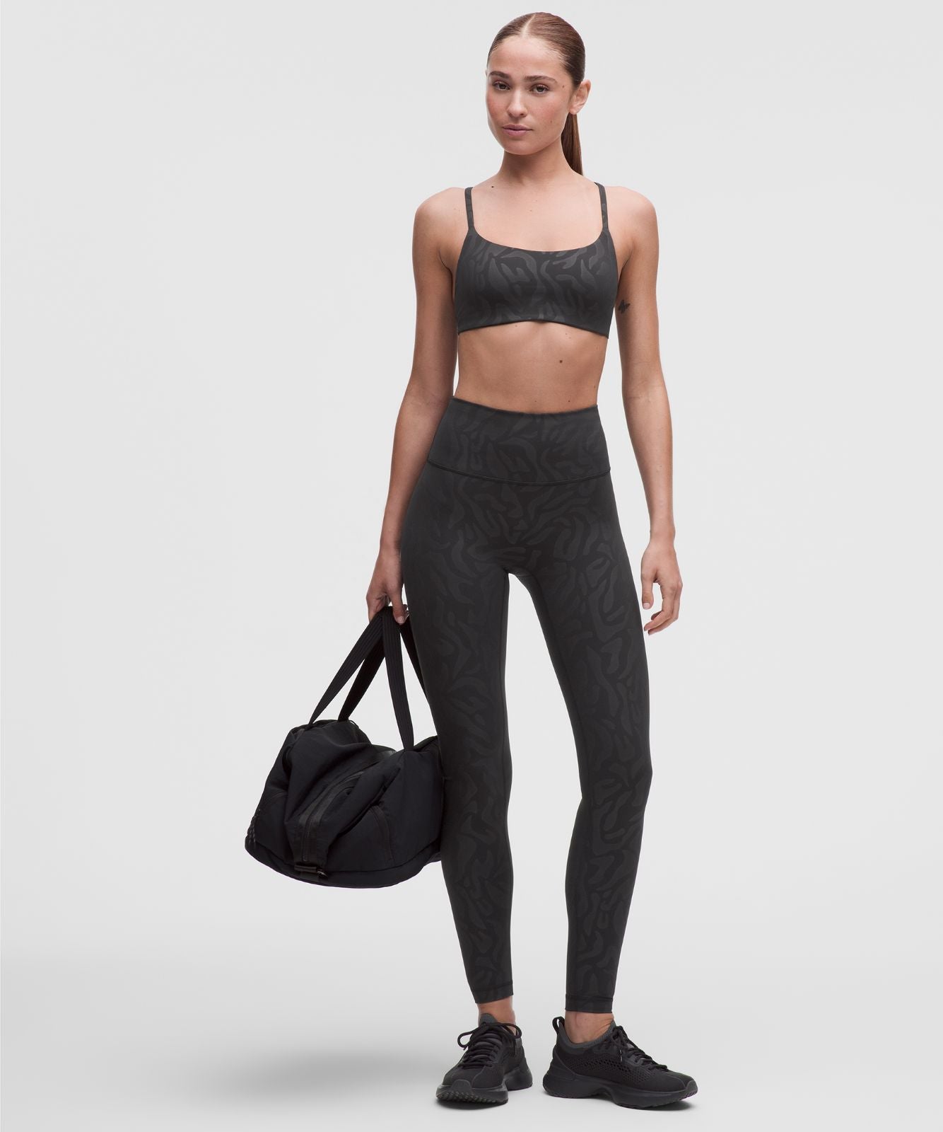 Wunder Train Strappy Racer Bra *Light Support, A/B Cup Zebra Camo Emboss Black