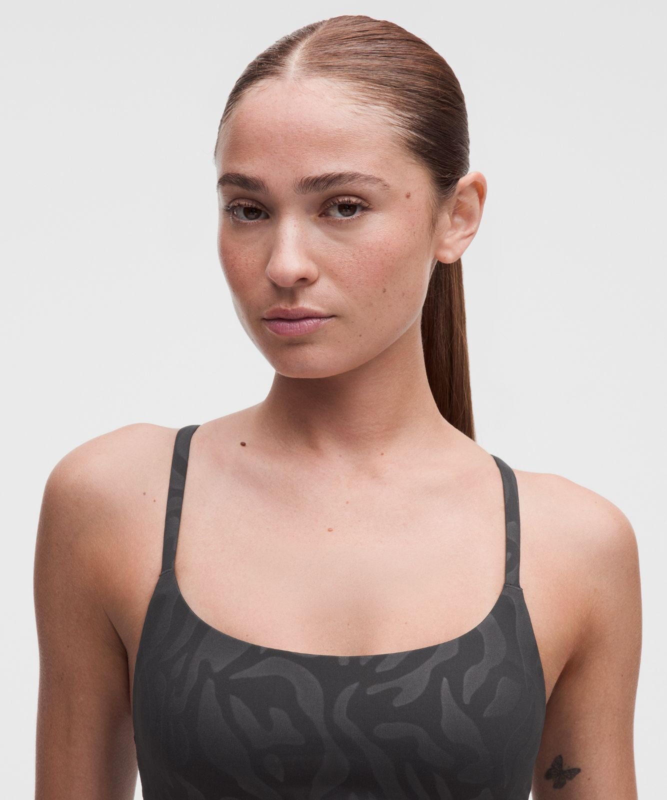 Wunder Train Strappy Racer Bra *Light Support, A/B Cup Zebra Camo Emboss Black