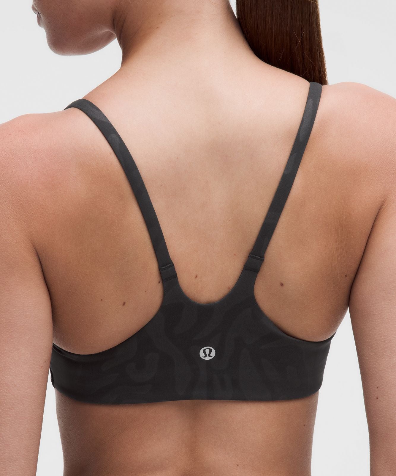 Wunder Train Strappy Racer Bra *Light Support, A/B Cup Zebra Camo Emboss Black